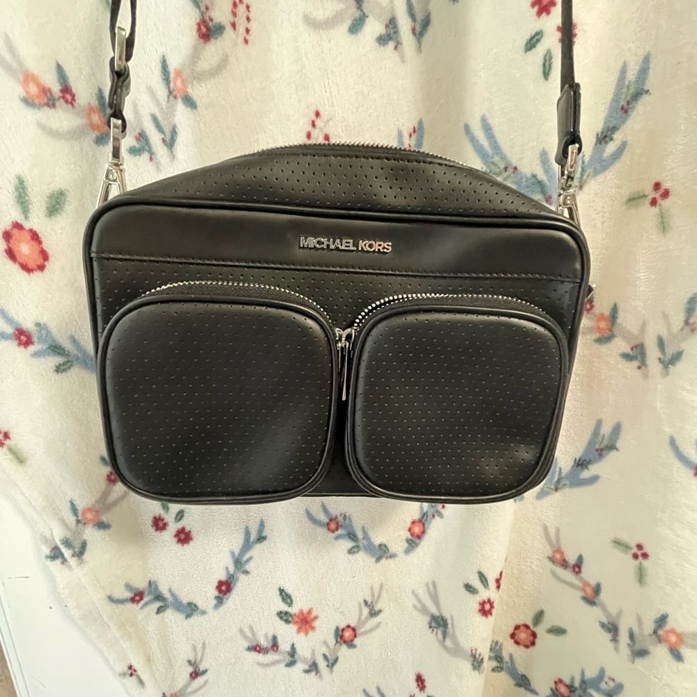 Michael Kors crossbody bag, lightly used, zipper closure.